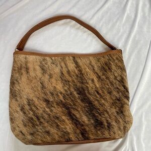 Tan and Brown Hobo Bag with Elegant Design
